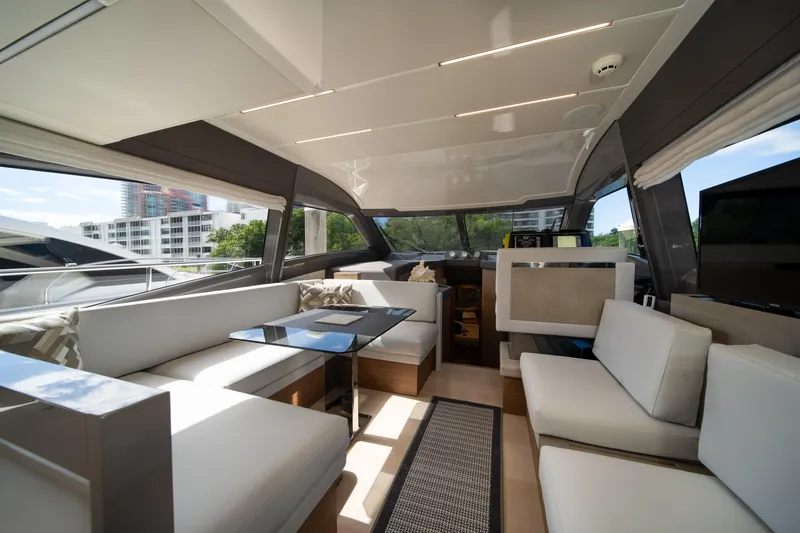  Yacht Photos Pics Luxurious interior of 2018 Ferretti Yachts 450 fly, featuring elegant seating and modern design.