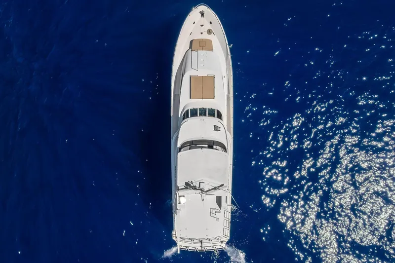 Bravo Zulu Yacht Photos Pics Aerial view of 1997 Westship Raised Pilothouse Motor Yacht on deep blue ocean.