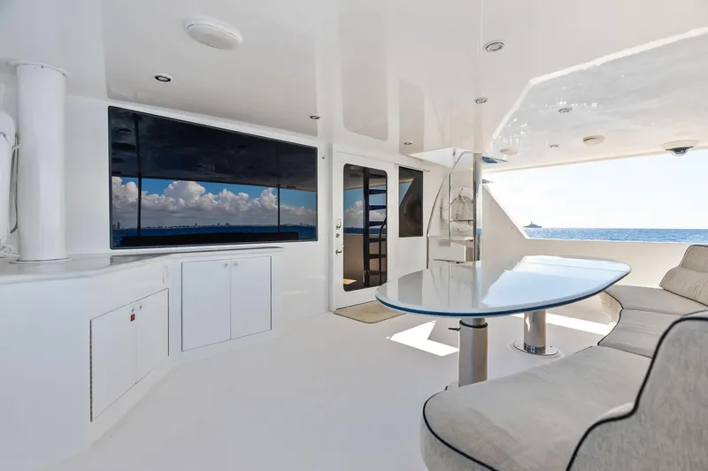 Bravo Zulu Yacht Photos Pics Luxurious 1997 Westship Raised Pilothouse Motor Yacht interior with ocean view and modern seating.