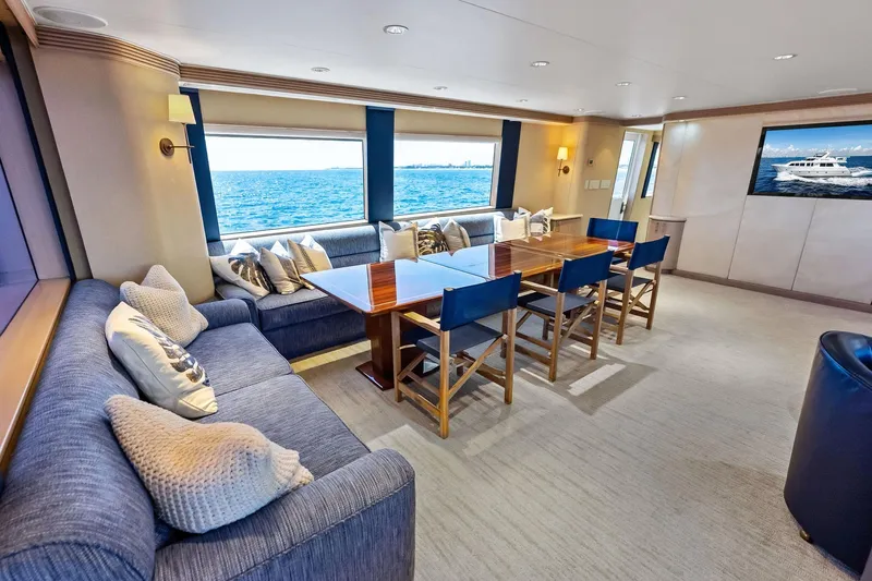 Bravo Zulu Yacht Photos Pics Luxurious interior of 1997 Westship Raised Pilothouse Motor Yacht with ocean view and elegant seating.
