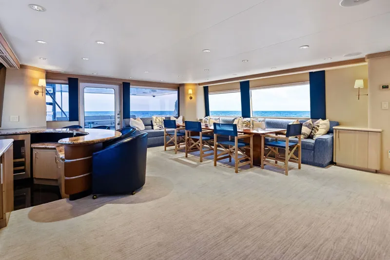 Bravo Zulu Yacht Photos Pics Luxurious interior of 1997 Westship Raised Pilothouse Motor Yacht with elegant seating and ocean views.