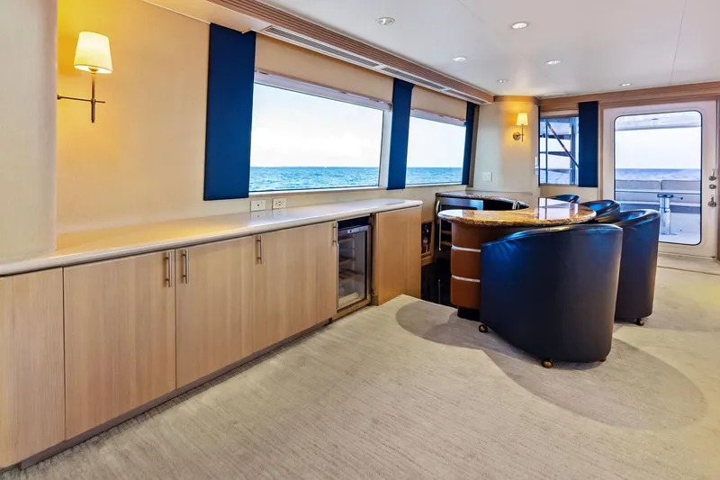 Bravo Zulu Yacht Photos Pics Luxurious interior of 1997 Westship Raised Pilothouse Motor Yacht with ocean view.