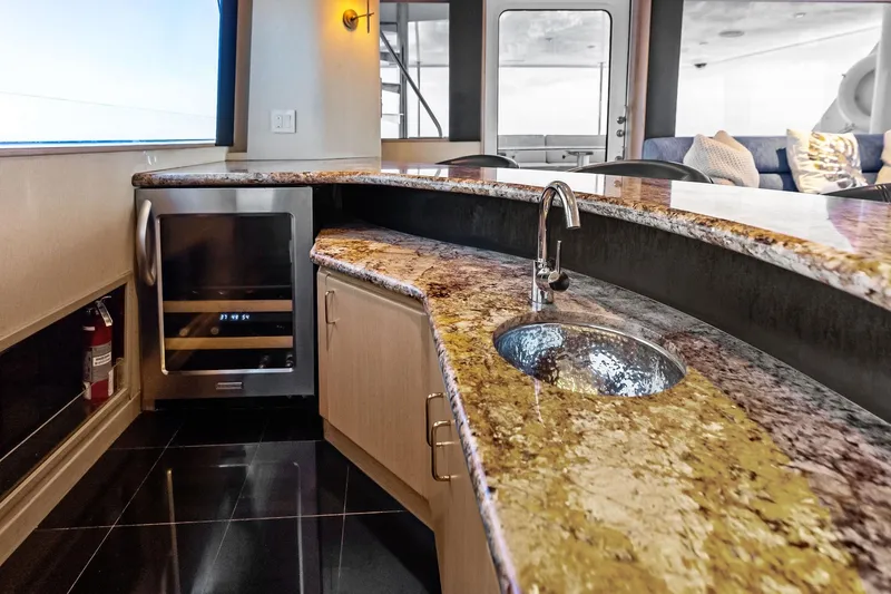 Bravo Zulu Yacht Photos Pics Luxurious 1997 Westship yacht interior with granite countertop and modern amenities.