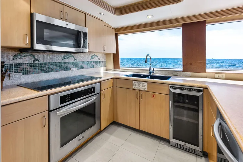 Bravo Zulu Yacht Photos Pics Luxurious kitchen in 1997 Westship Raised Pilothouse Motor Yacht with ocean view.