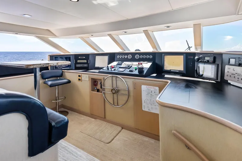 Bravo Zulu Yacht Photos Pics Pilothouse interior of 1997 Westship Raised Pilothouse Motor Yacht with ocean view.