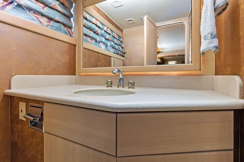 Bravo Zulu Yacht Photos Pics Luxurious bathroom vanity in 1997 Westship Raised Pilothouse Motor Yacht.