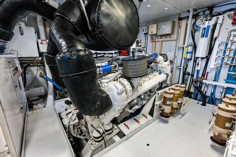 Bravo Zulu Yacht Photos Pics Engine room of 1997 Westship Raised Pilothouse Motor Yacht, showcasing machinery and components.