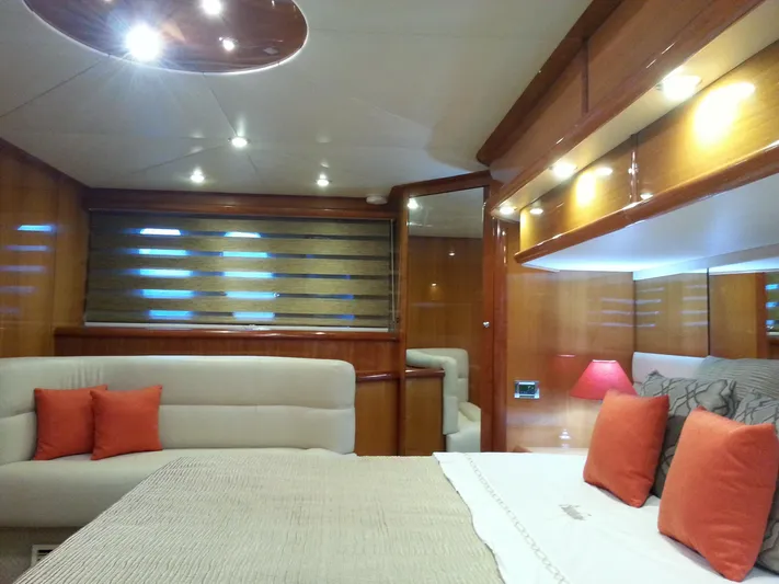 Sunshine Yacht Photos Pics Luxurious interior of 2004 Sunseeker Manhattan 64 yacht with elegant wood finishes.