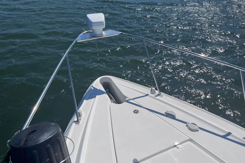  Yacht Photos Pics Bow of 2007 Cruisers Yachts 370 Express on sparkling water.