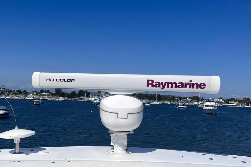  Yacht Photos Pics Raymarine HD Color radar on 2007 Cruisers Yachts 370 Express, with boats in the background.