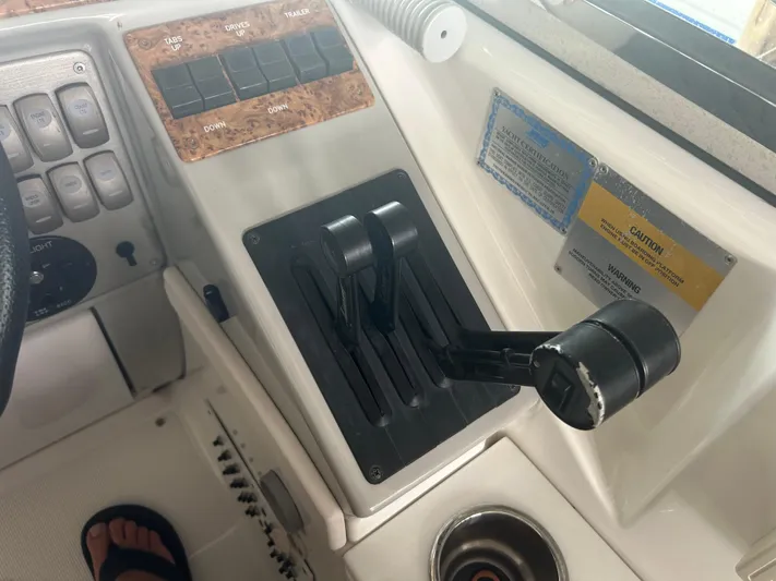  Yacht Photos Pics Control panel of a 2007 Formula 31 PC boat with throttle levers and switches.