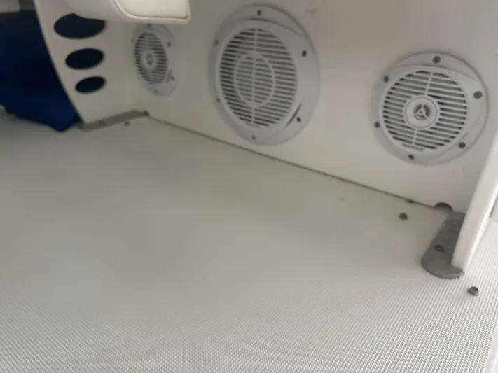  Yacht Photos Pics 2007 Formula 31 PC boat interior with speakers and white textured flooring.