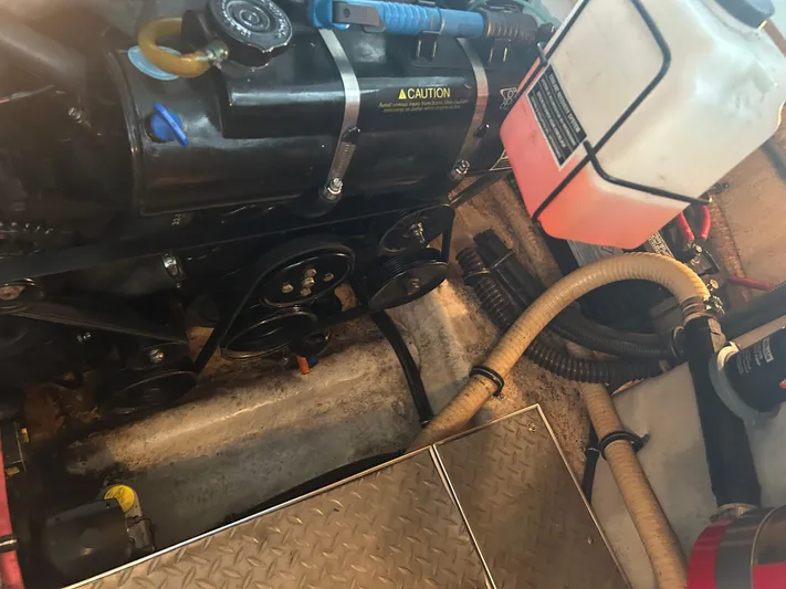  Yacht Photos Pics Engine compartment of a 2007 Formula 31 PC boat, showing belts and hoses.
