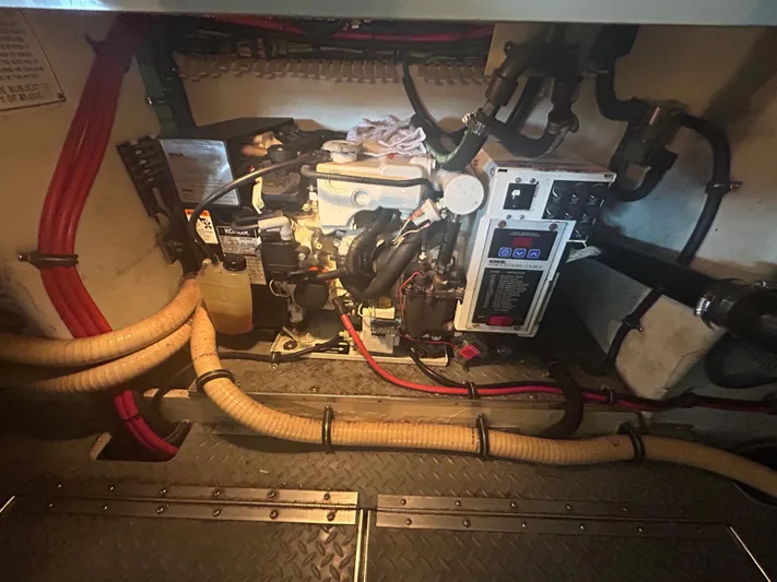  Yacht Photos Pics Engine room of a 2007 Formula 31 PC boat, featuring various hoses and components.