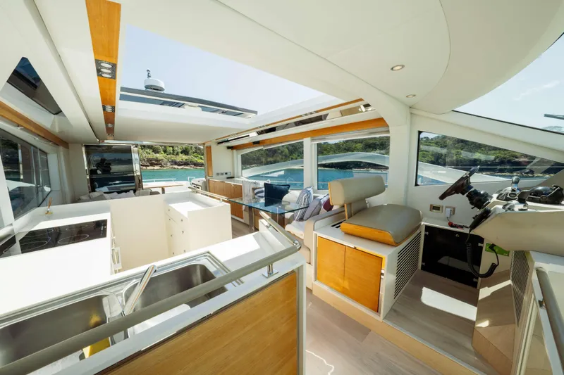 Impulse Yacht Photos Pics Luxurious interior of 2017 Numarine 62 Hardtop yacht with modern amenities and scenic views.