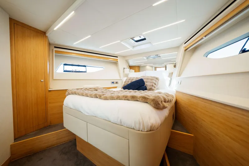 Impulse Yacht Photos Pics Luxurious bedroom interior of 2017 Numarine 62 Hardtop yacht with modern design.