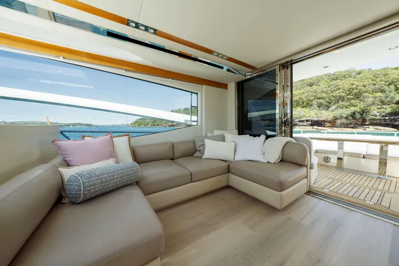 Impulse Yacht Photos Pics Luxurious interior of 2017 Numarine 62 Hardtop yacht with scenic ocean view.