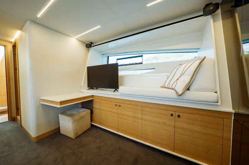 Impulse Yacht Photos Pics Luxurious interior of 2017 Numarine 62 Hardtop yacht with modern furnishings and sleek design.