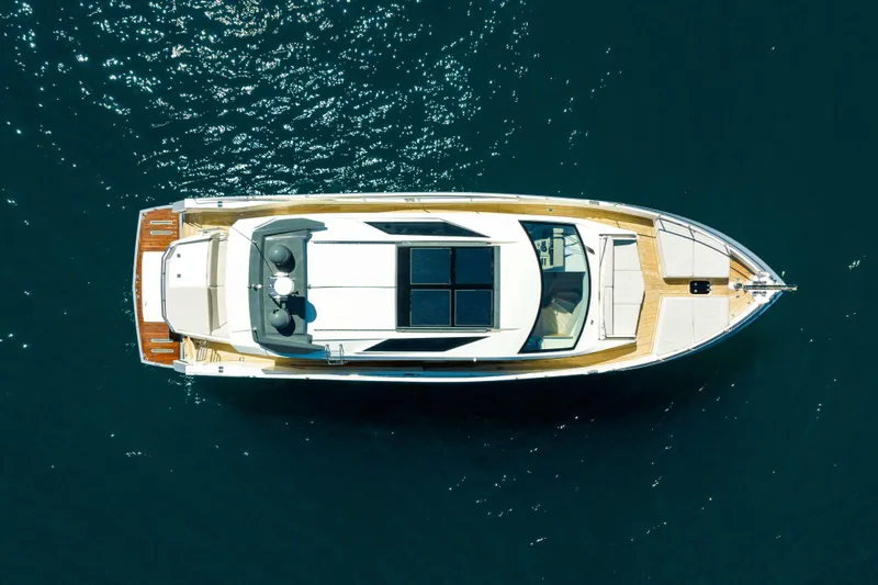 Impulse Yacht Photos Pics Overhead view of 2017 Numarine 62 Hardtop yacht on calm water.