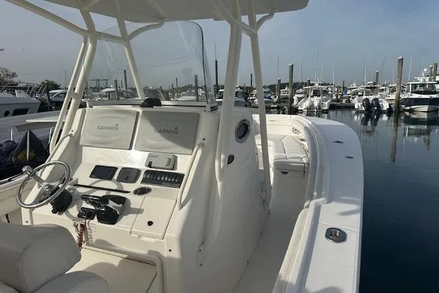 Resolute Yacht Photos Pics 2017 Regulator 31 boat with Garmin electronics docked in a marina.