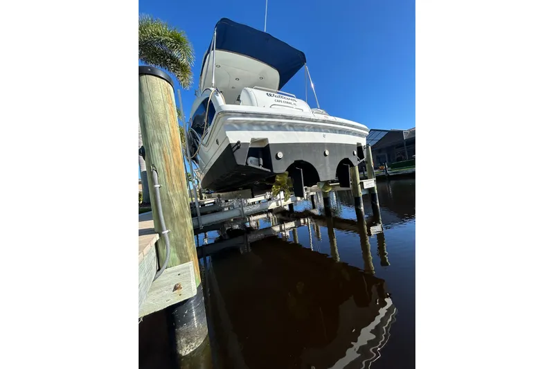 Wattever Yacht Photos Pics 2008 Formula 34 Performance Cruiser docked, rear view, sunny day, calm water.