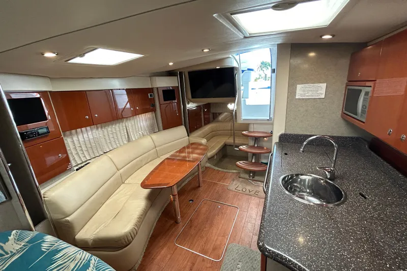 Wattever Yacht Photos Pics Luxurious interior of 2008 Formula 34 Performance Cruiser with modern amenities and elegant design.