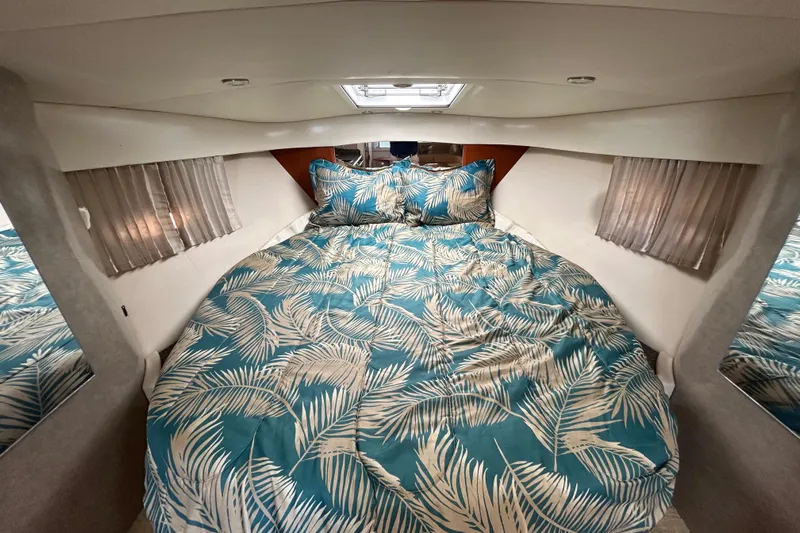 Wattever Yacht Photos Pics 2008 Formula 34 Performance Cruiser cabin with tropical bedding and natural light.