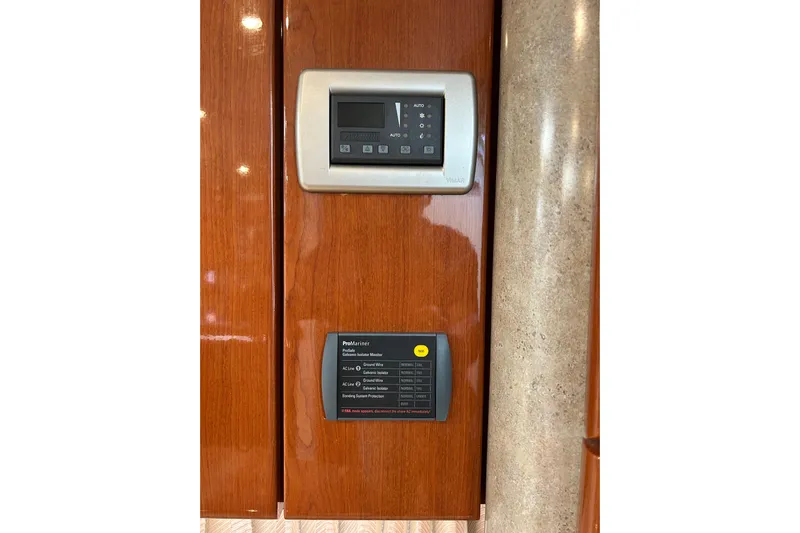 Wattever Yacht Photos Pics Control panels on 2008 Formula 34 Performance Cruiser, featuring wood finish and modern design.
