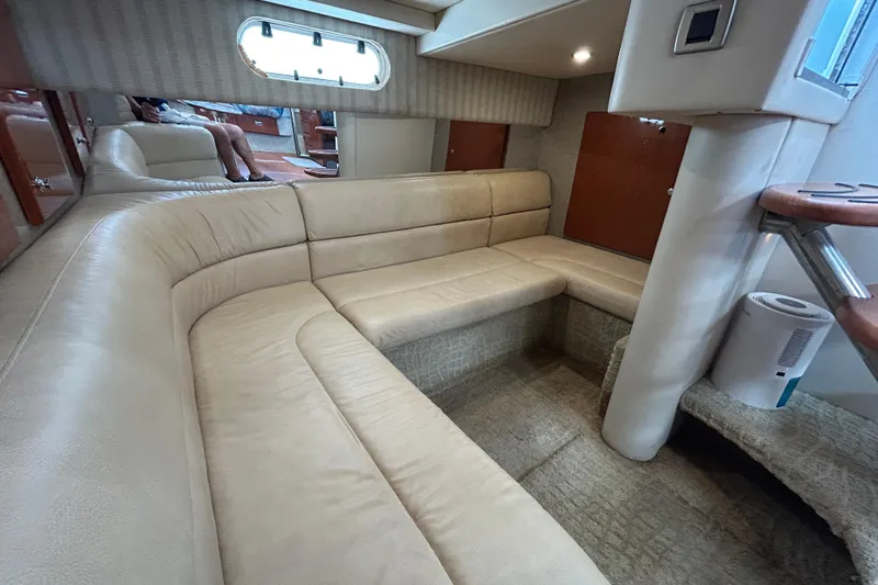 Wattever Yacht Photos Pics Interior of 2008 Formula 34 Performance Cruiser with beige leather seating and modern design.