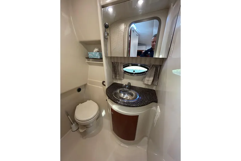 Wattever Yacht Photos Pics 2008 Formula 34 Performance Cruiser bathroom with sink, mirror, and toilet.