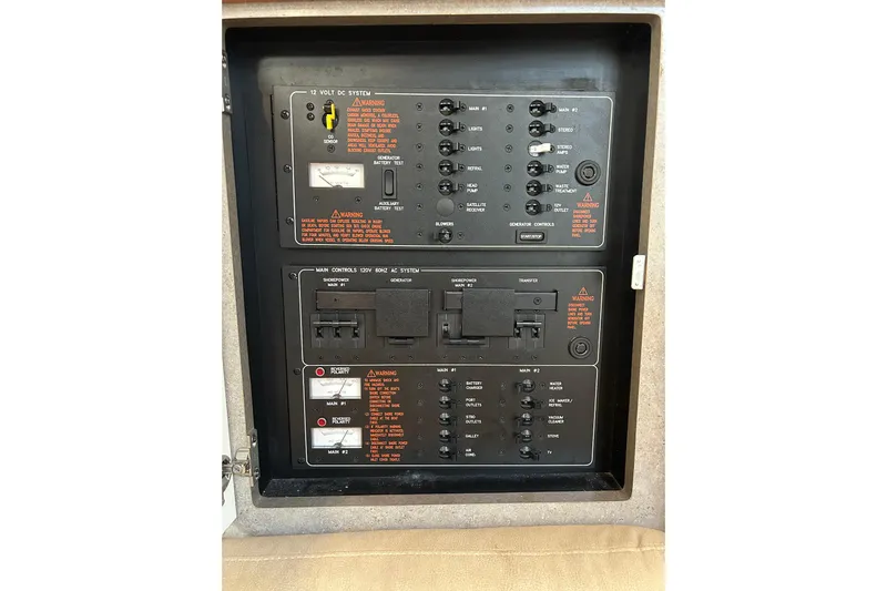 Wattever Yacht Photos Pics Control panel of a 2008 Formula 34 Performance Cruiser, featuring electrical system switches.