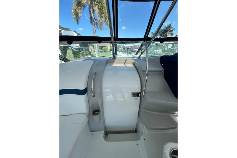 Wattever Yacht Photos Pics 2008 Formula 34 Performance Cruiser interior with seating and helm, under clear blue sky.