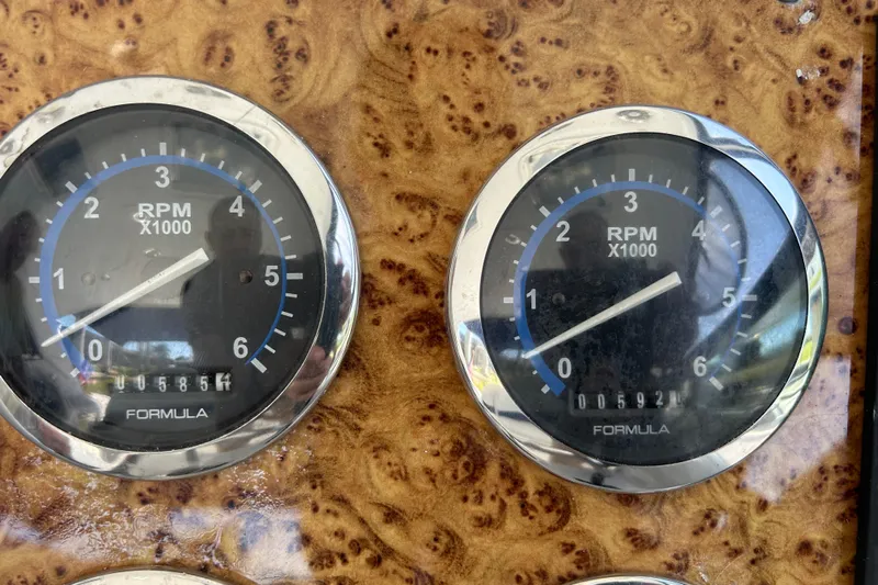 Wattever Yacht Photos Pics Close-up of RPM gauges on a 2008 Formula 34 Performance Cruiser dashboard.
