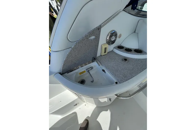 Wattever Yacht Photos Pics 2008 Formula 34 Performance Cruiser interior with sink and cup holders.