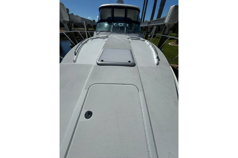 Wattever Yacht Photos Pics 2008 Formula 34 Performance Cruiser boat deck, sleek design, docked under clear sky.