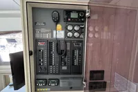 Electrical control panel inside a 2019 Leopard 40 catamaran, featuring various switches and gauges.