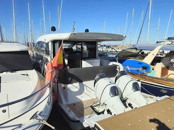  Yacht Photos Pics 2024 Sealine C390V yacht docked at marina with twin outboard engines.