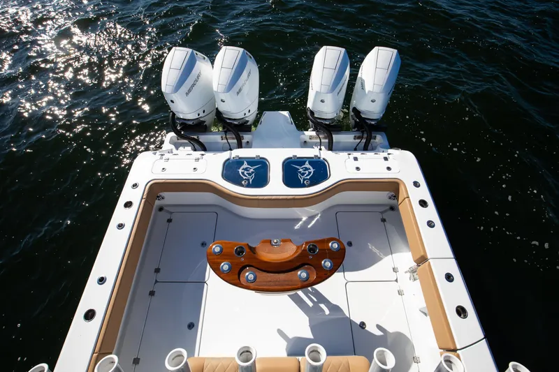 43 Freeman 2025 Yacht Photos Pics 2025 Freeman 43 Center Console boat with four Mercury engines on water.