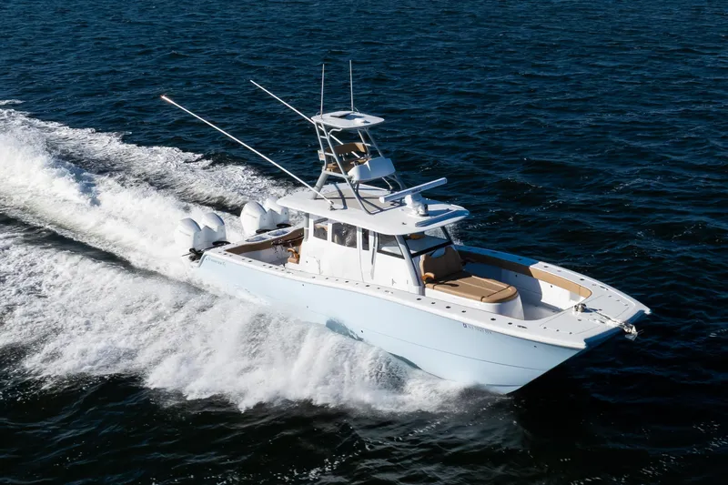 43 Freeman 2025 Yacht Photos Pics 2025 Freeman 43 Center Console boat cruising on open water.