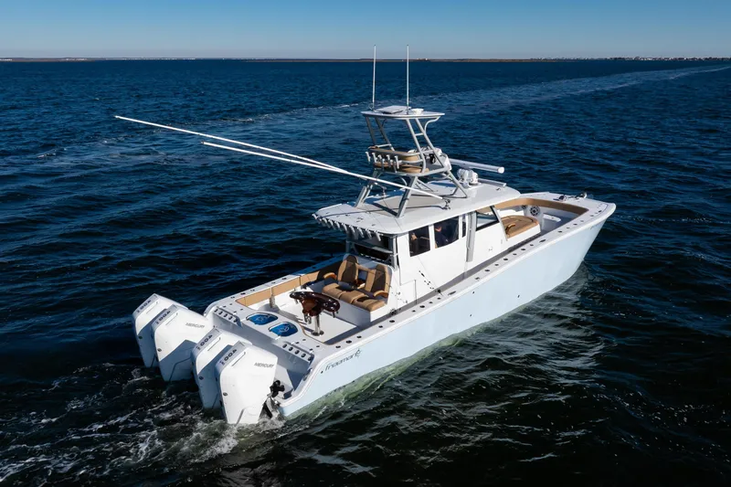 43 Freeman 2025 Yacht Photos Pics 2025 Freeman 43 Center Console boat cruising on open water.