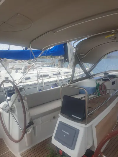  Yacht Photos Pics 2008 Beneteau Oceanis 50 sailboat cockpit with dual steering wheels and navigation equipment.