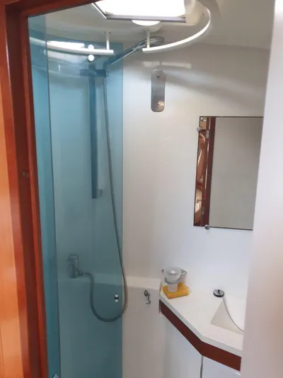  Yacht Photos Pics Bathroom interior of 2008 Beneteau Oceanis 50 yacht with shower and sink.