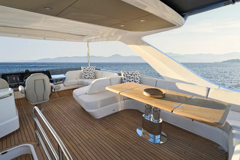  Yacht Photos Pics Luxurious 2026 Princess F58 yacht interior with elegant seating and ocean view.