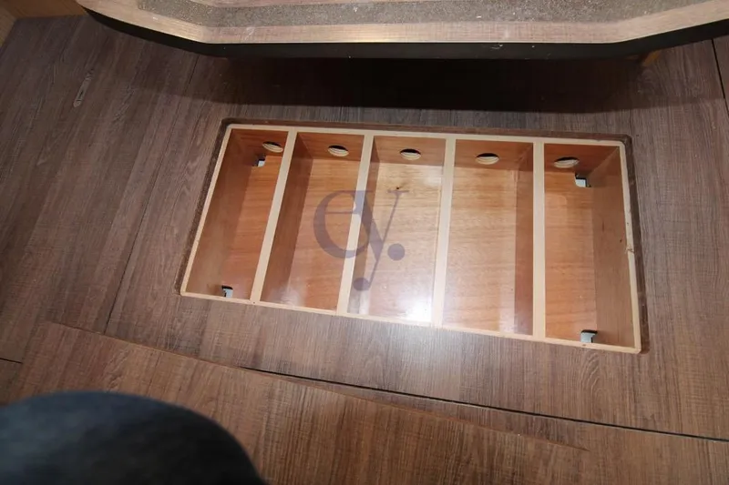 A Yacht Photos Pics Wooden storage compartment on 2018 Beneteau Oceanis 45 yacht floor.