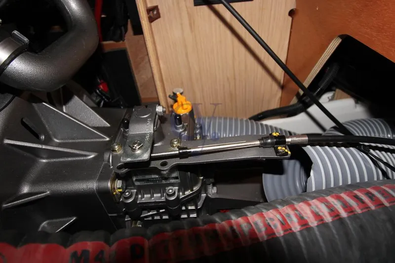 A Yacht Photos Pics Engine compartment of a 2018 Beneteau Oceanis 45 sailboat, showcasing mechanical components.