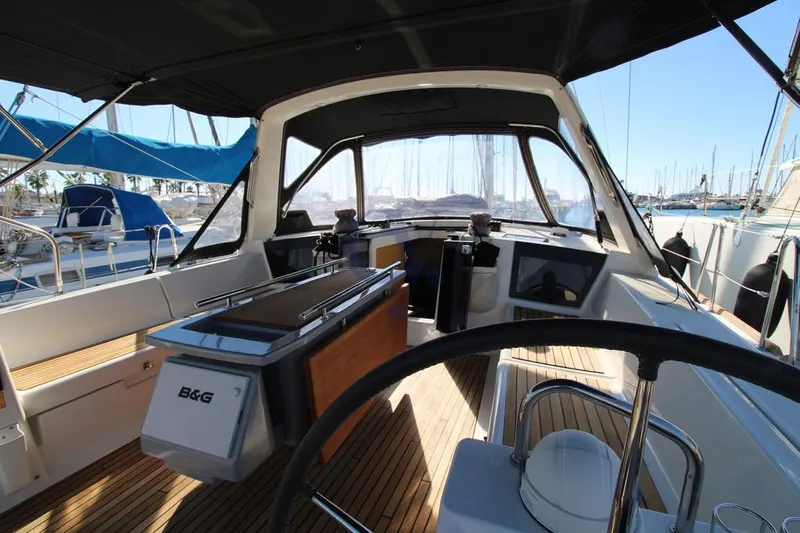 A Yacht Photos Pics Cockpit of 2018 Beneteau Oceanis 45 sailboat with modern navigation equipment.