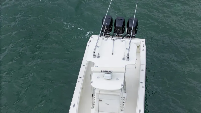  Yacht Photos Pics 2015 SeaVee 340Z boat with triple outboard engines on open water.