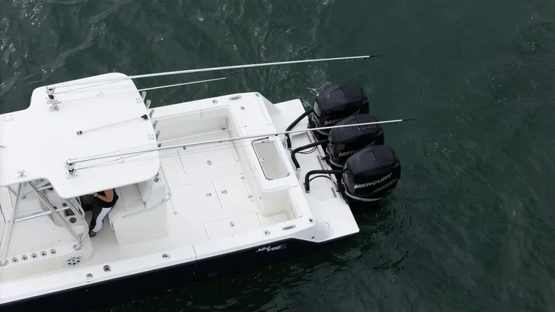  Yacht Photos Pics 2015 SeaVee 340Z boat with triple outboard engines on water.