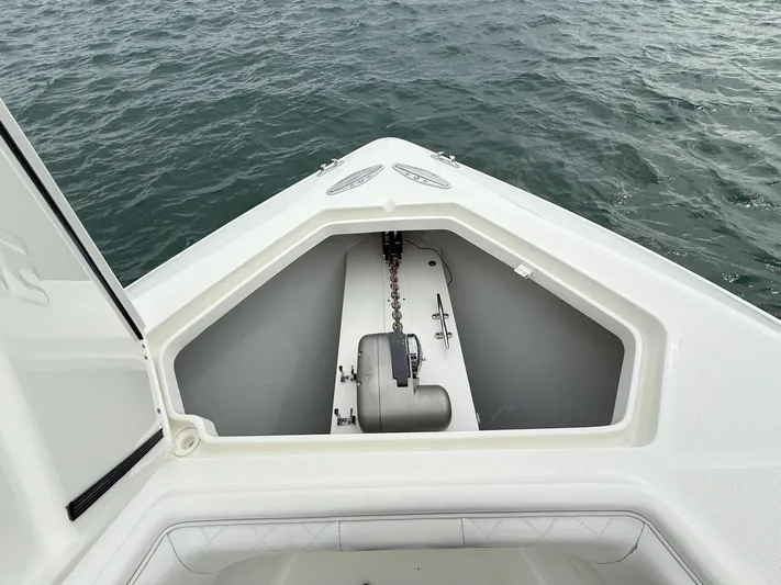  Yacht Photos Pics 2015 SeaVee 340Z boat anchor compartment on calm water.