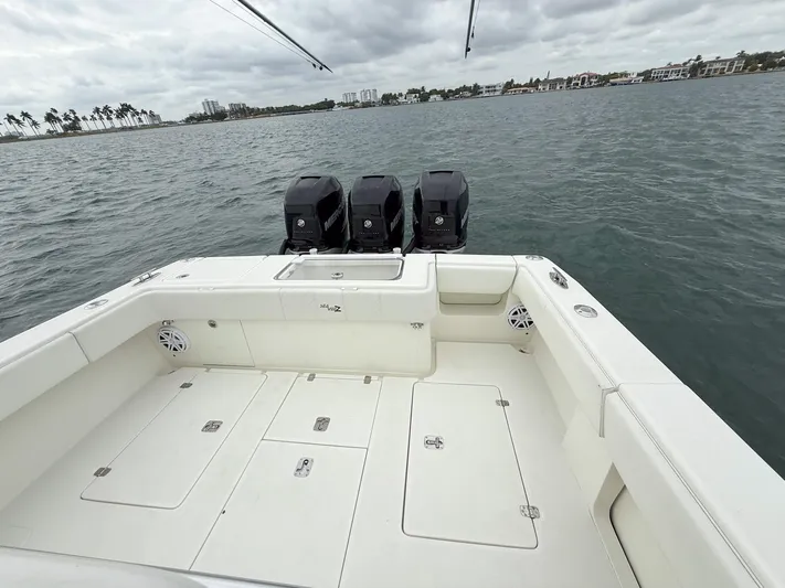  Yacht Photos Pics 2015 SeaVee 340Z boat with triple engines on open water.